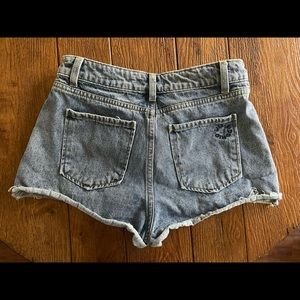 Mini Denim Short. 5 pockets. New, never warn but no tags.